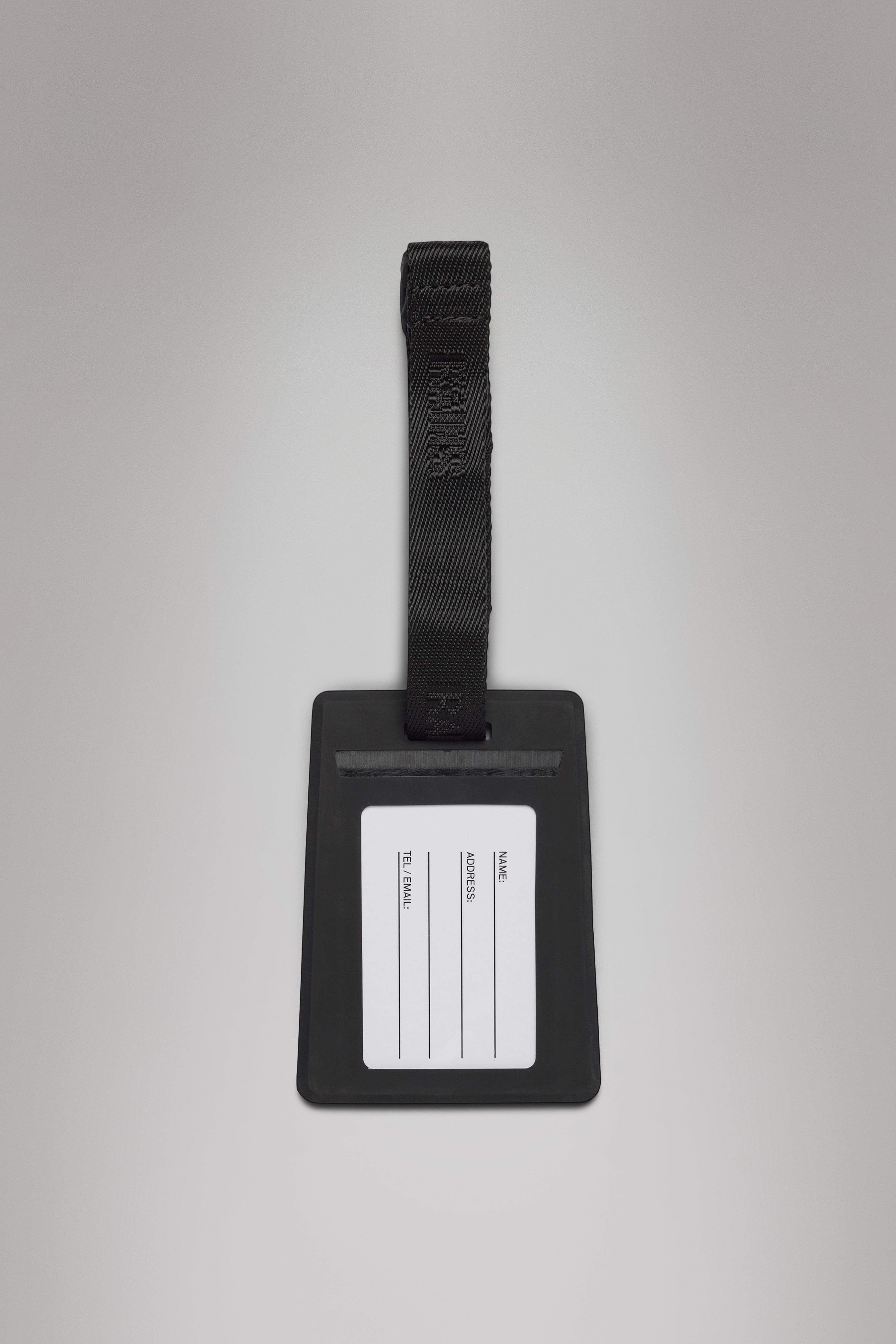 RAINS Travel Tag Black Lifestyle