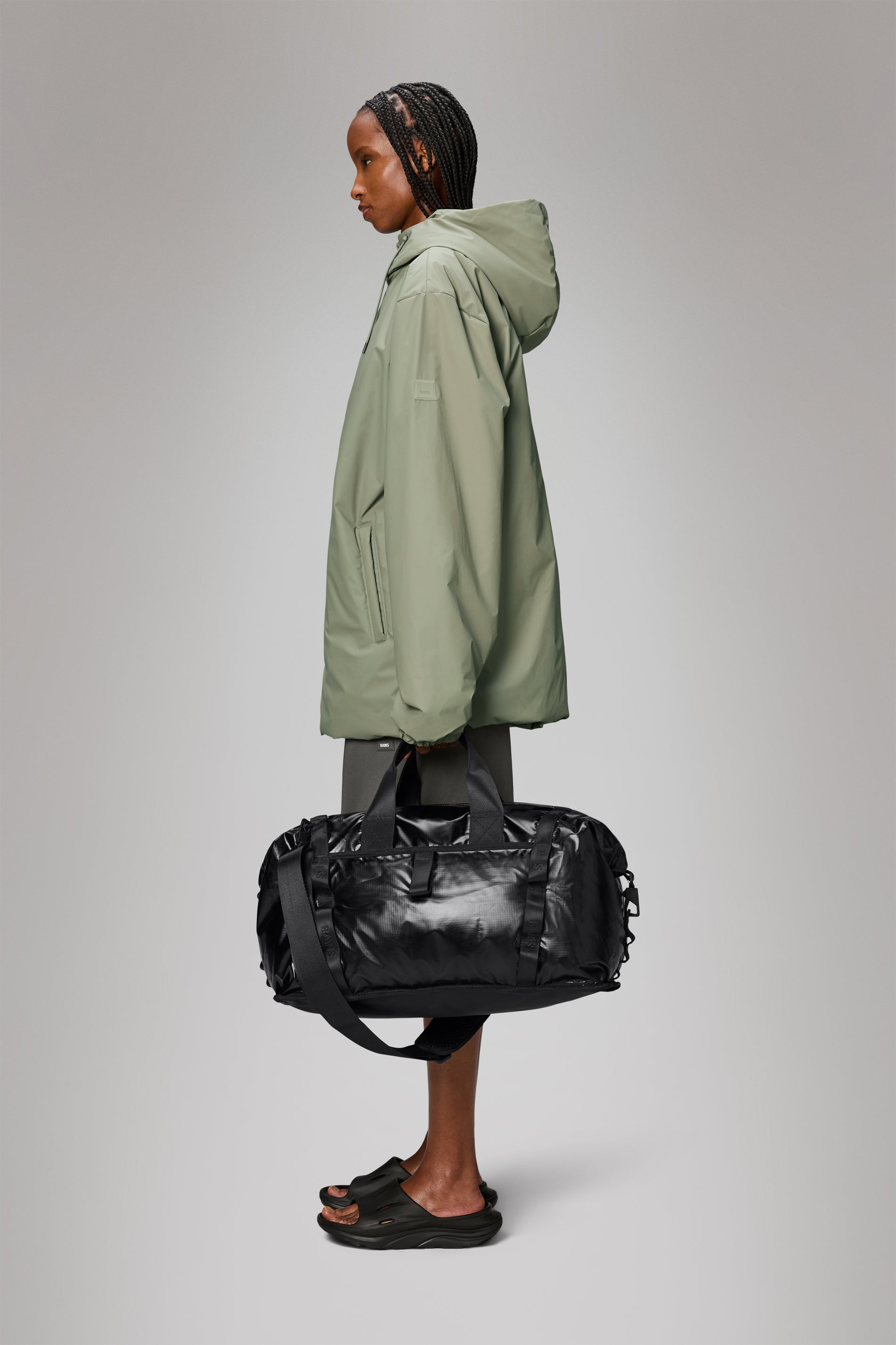 RAINS Sibu Weekend Bag Black 44L H29 x D26 x W58.50 cm Weekender