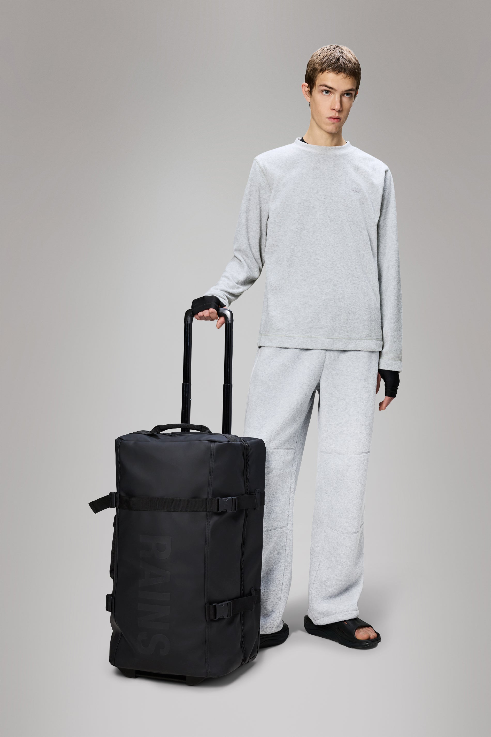 RAINS Texel Check-in Bag Black 62L H64 x D27 x W36 cm Trolley