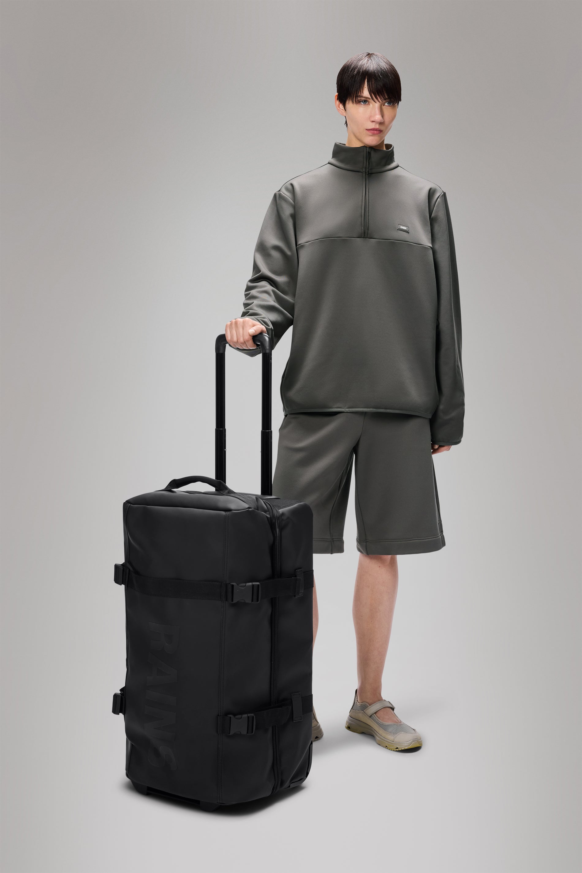 RAINS Texel Check-in Bag Black 62L H64 x D27 x W36 cm Trolley